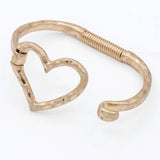Worn Gold Sculpted Metal Hammered Heart Cutout Bangle Bracelet