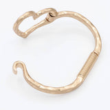 Worn Gold Sculpted Metal Hammered Heart Cutout Bangle Bracelet